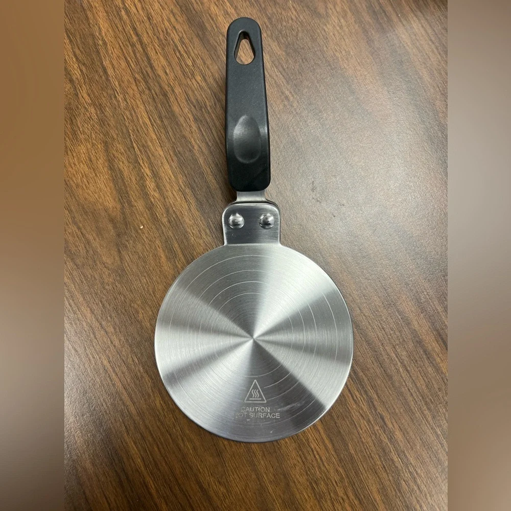 Induction plate. New in box.